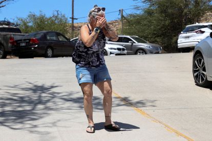 Una mujer llora tras conocer que su casa ha sido destrozada por las llamas, el miércoles en Kahului.